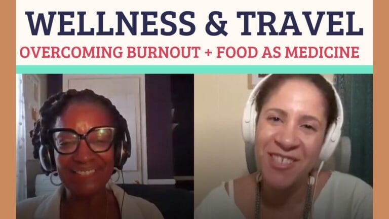 Two joyful Black women over 40 - one with locs and one with a short Afro with headphones on smiling during a podcast interview